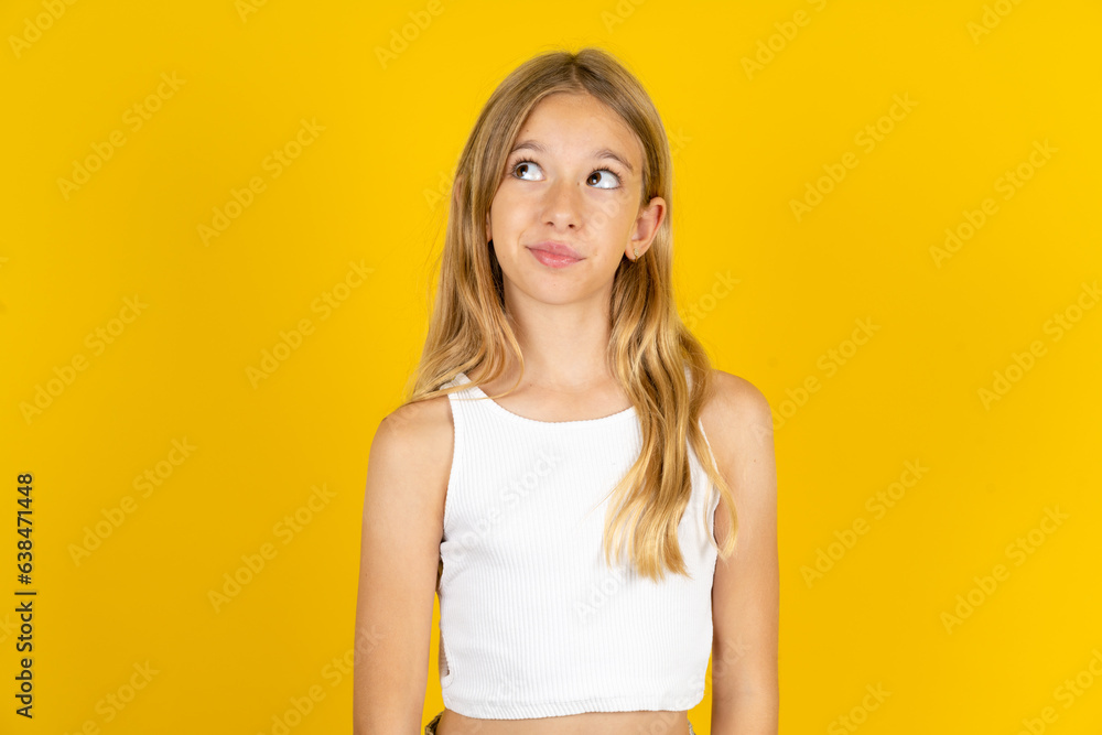beautiful kid girl looking aside into empty space thoughtful beautiful kid girl looking aside into empty space thoughtful