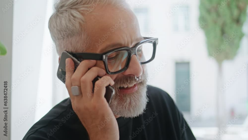 Stylish man chatting smartphone closeup. Handsome senior ending call working Stylish man chatting smartphone closeup. Handsome senior ending call working