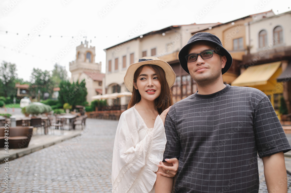 Happy Young asian couple travel at old town italy style,Honeymoon couples after marriage,Toursit concept
