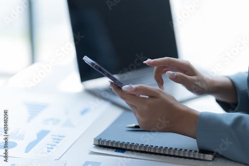 financial analysts analyze business financial reports planning investment project during a discussion at a meeting of corporate showing the results of their successful teamwork.