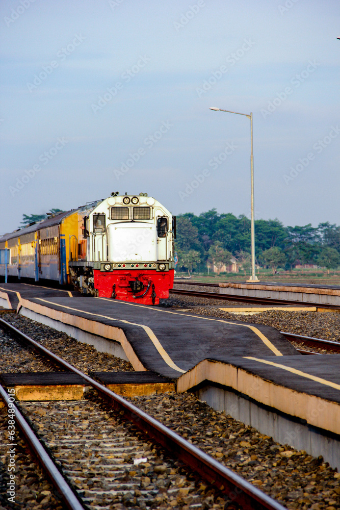 Obraz premium commuter train traveling at morning