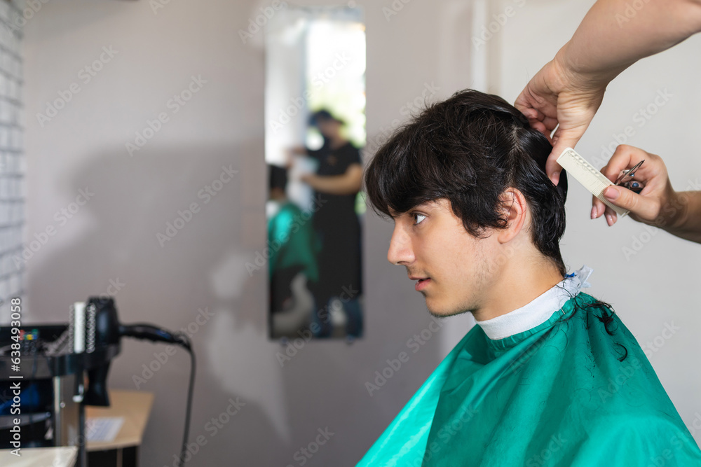 Young man in the salon Young man in the salon