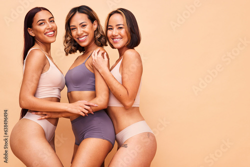 Diversity, beauty and portrait of happy women in underwear with smile, self love and solidarity in studio mockup. Happy face, group of people on beige background with equality, skincare and cosmetics