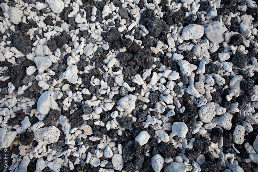 Black and white beach rocks, Kona, Hawaii.
Black lava rocks and white coral rocks Black and white beach rocks, Kona, Hawaii.
Black lava rocks and white coral rocks
