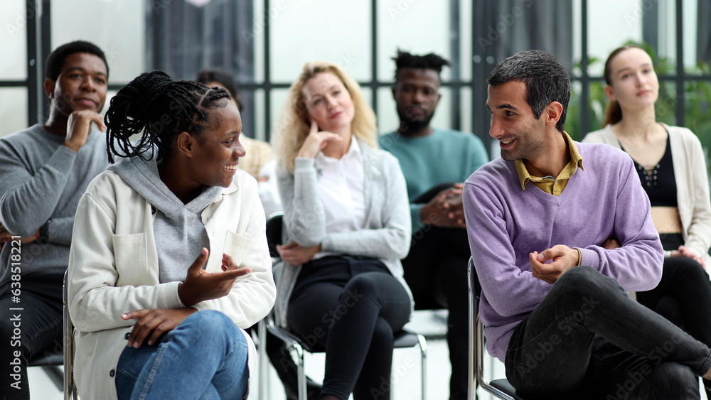young people shaking hands in a circle of like-minded people young people shaking hands in a circle of like-minded people