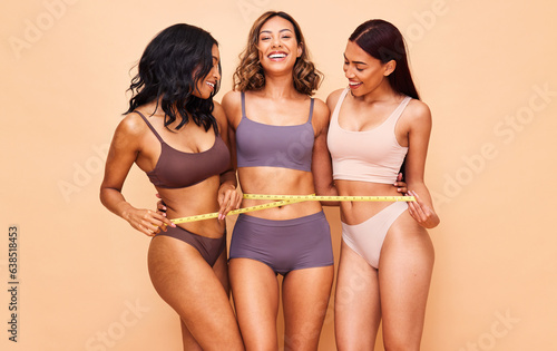 Εκτύπωση καμβά Girl friends, underwear and measuring tape in studio portrait for laugh, wellness and diversity by background