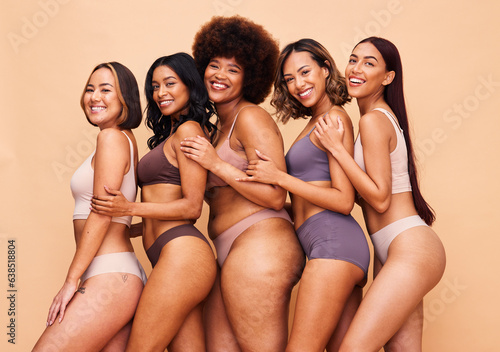 Body positive, diversity and portrait of women happy in studio for wellness, beauty and self love. Underwear campaign, natural and people on brown background for confidence, skincare and inclusion