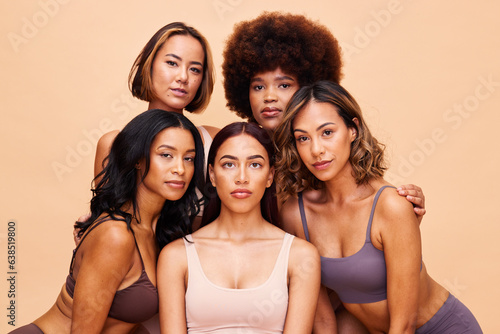Diversity, beauty and portrait, group of women with self love and solidarity in studio together. Cosmetics on face, power people on beige background with underwear, skincare and makeup for equality.
