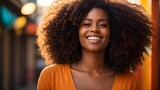 A captivating portrait capturing the beauty and charisma of a woman with stunning afro hair, smiling radiantly against a bright and cheerful background. 