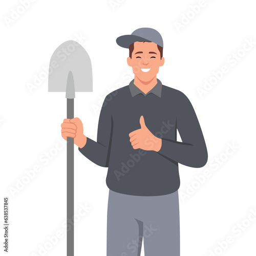Farmer holding shovel in hand. Farmer standing with spade. Farming work, gardening. Agricultural worker with garden tool.