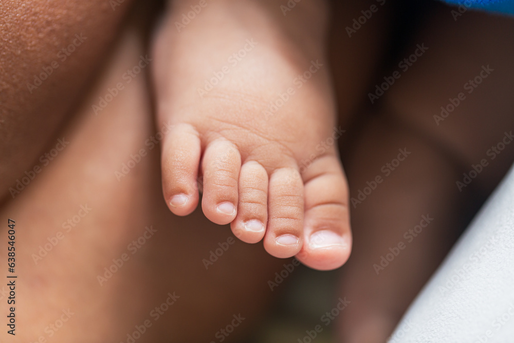 baby feet,Baby feet in hands, tiny newborn baby feet on hands, female close-up portrait, mother and her baby, happy family concept, beautiful conception image of childbirth. baby feet,Baby feet in hands, tiny newborn baby feet on hands, female close-up portrait, mother and her baby, happy family concept, beautiful conception image of childbirth.