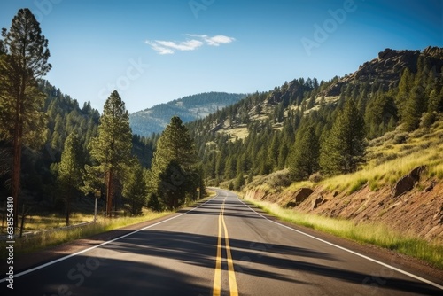 Open Road Enclosed by Mountain Forest Landscape