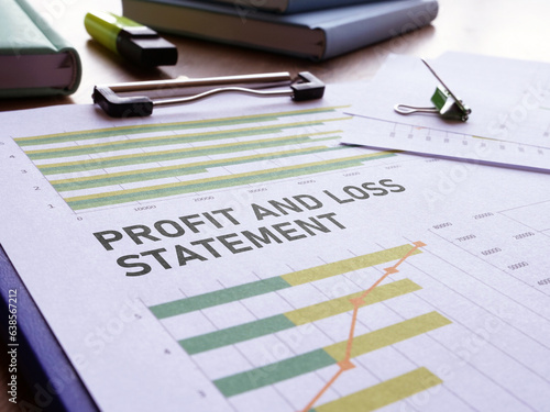 Bild auf Leinwand Profit and loss statement is shown using the text and photo of charts