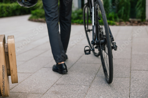 Close up picture of a man with a bike