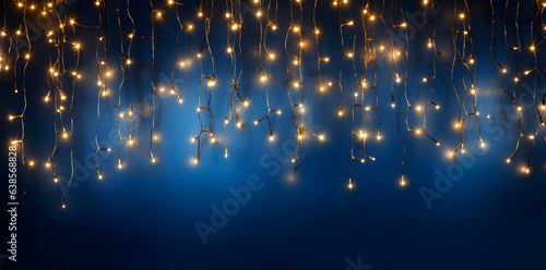 Hanging light bulbs on dark background. Cozy decoration indoor cafe or Christmas party vibe
