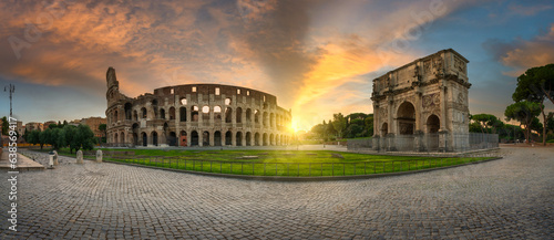 Colosseum panorama at sunrise in Rome, Italy 