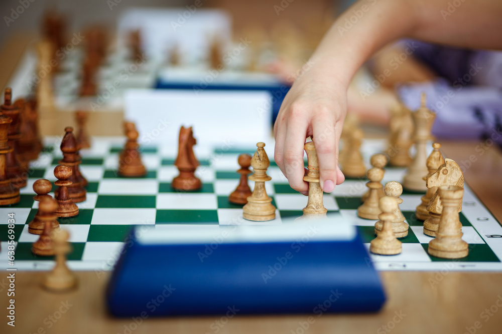 Board with chess pieces on the table. Board with chess pieces on the table.
