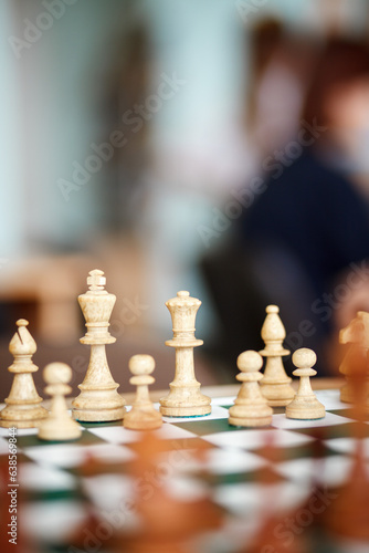 Obraz na plátně Board with chess pieces on the table.