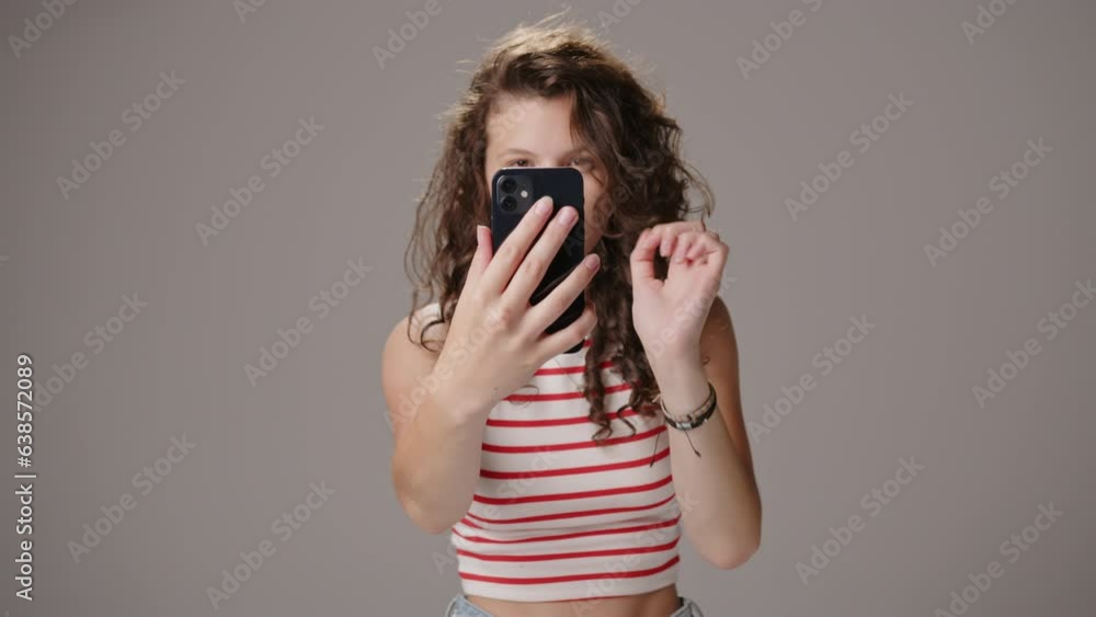 Caucasian teenage girl taking selfies with smartphone, social media trend Caucasian teenage girl taking selfies with smartphone, social media trend