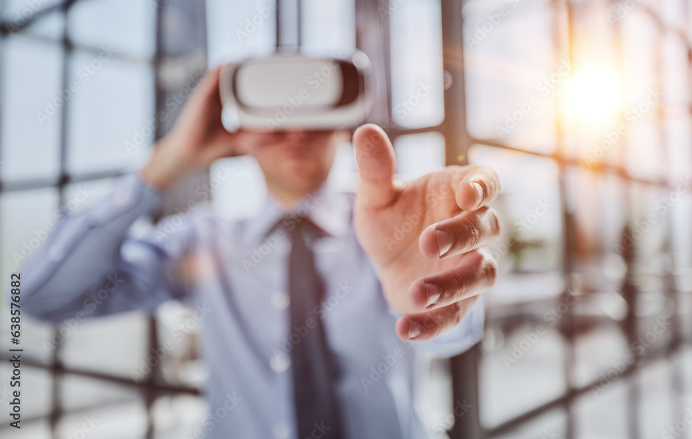 businessman in virtual reality headset in the office