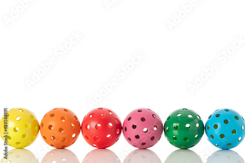 Colorful Pickleballs, yellow, orange, red, pink green, blue.