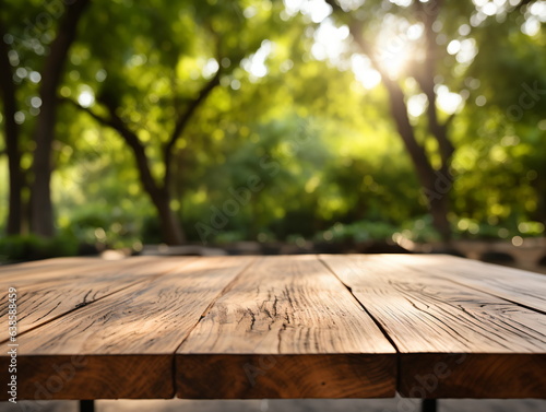 Wooden floor perspective and green forest with ray of light.