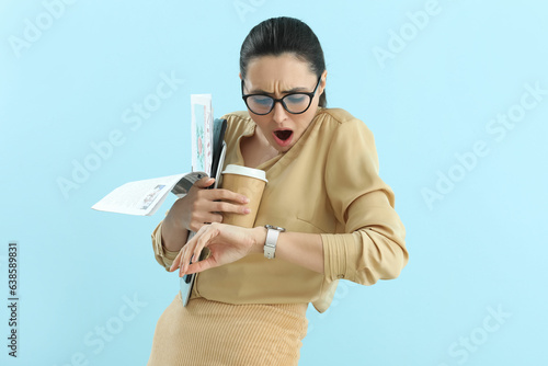 Shocked young businesswoman...
