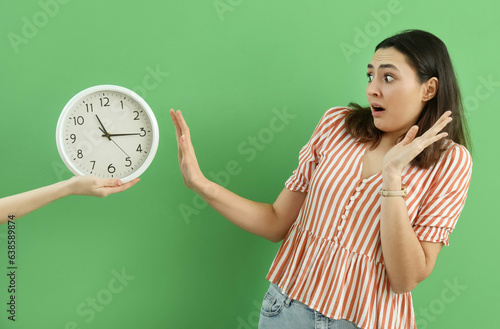 Shocked young woman with wa...