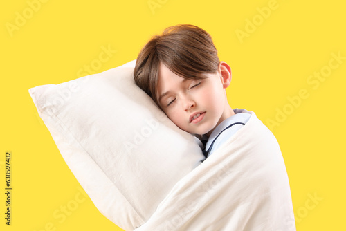 Sleepy little boy with pill...