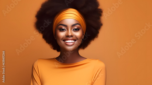 beautiful woman with afro hair smiling on bright background  smiling portrait