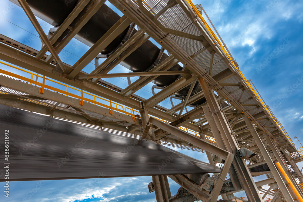 Close detail under the conveyor belt at a copper mine.