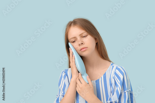 Young woman with tooth ache...