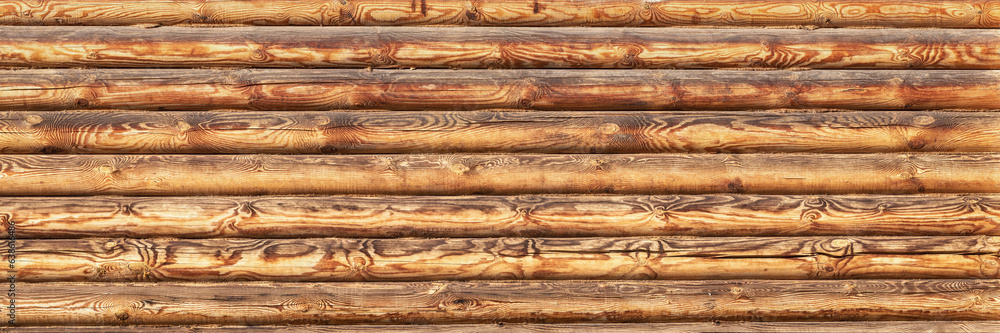 Wooden texture of the log house wall, background. Wooden texture of the log house wall, background.