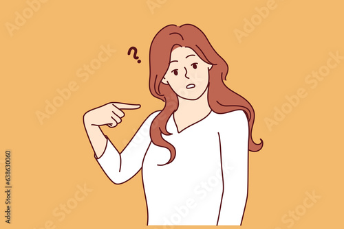 Embarrassed woman points finger at herself and looks puzzled at screen after hearing strange question. Embarrassed girl feels awkward because of incorrect statement or accusation against her