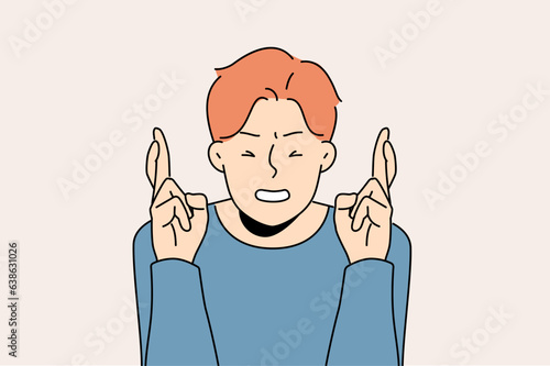 Man crosses fingers and closes eyes in hope of fulfilling wish or lucky fate. Casual superstitious guy makes wish about winning lottery or favorable circumstances for making money.