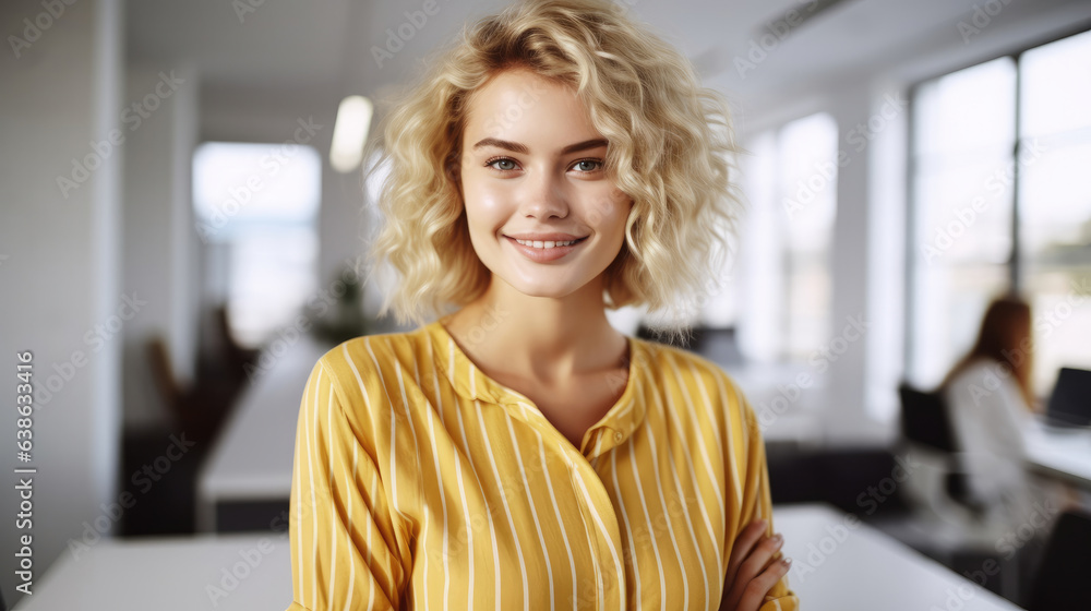 Attractive blond woman wearing yellow shirt while smiling at office, Beauty female portrait. Attractive blond woman wearing yellow shirt while smiling at office, Beauty female portrait.