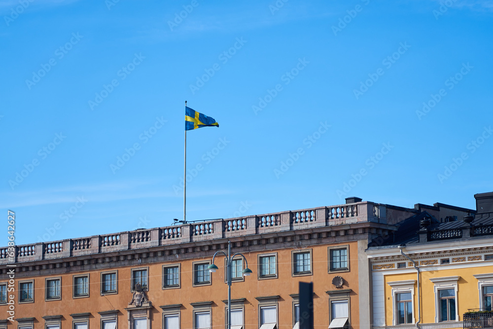 Obraz premium The flag of Sweden on the building of the Embassy of Sweden in Helsinki.