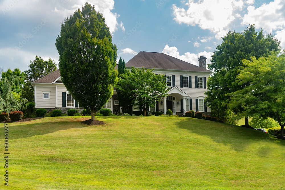 Large country house with landscaping. Large country house with landscaping.