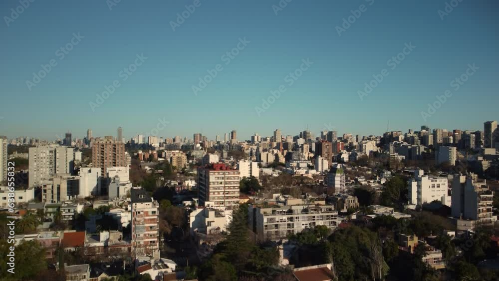 The drone is flying over the sunny city of Buenos Aires, blue sky, no clouds The drone is flying over the sunny city of Buenos Aires, blue sky, no clouds