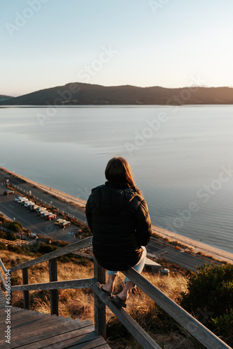 Wallpaper Mural Woman watching the sunset Torontodigital.ca