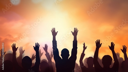 Silhouette of a group of people raising their hands in the air, human rights day