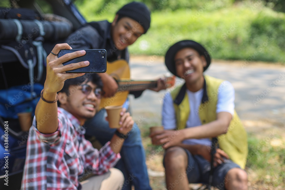 Friends on car road trip taking selfie Friends on car road trip taking selfie