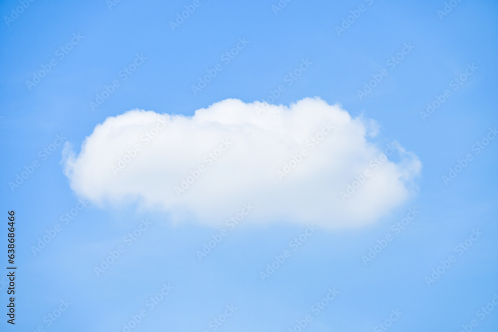 beautiful blue sky and white fluffy single cloud with sunrise in the morning, natural background beautiful blue sky and white fluffy single cloud with sunrise in the morning, natural background
