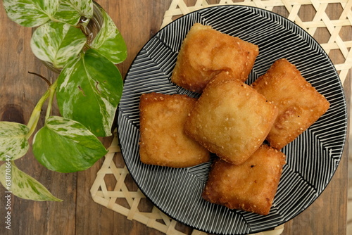 Odading or Galundeng is a traditional sweet made from flour and sugar and process in deep fried. Indonesian food.  photo