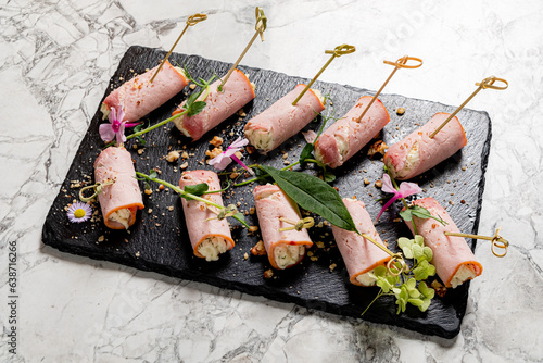 stuffed ham rolls on Christmas table