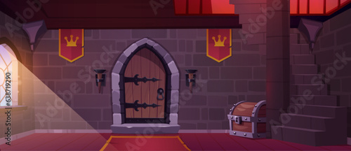 Medieval castle hall with wooden door. Vector cartoon illustration of stone staircase in fairytale tower, red flags with royal crown emblem on wall, treasure chest on floor, sunlight in window