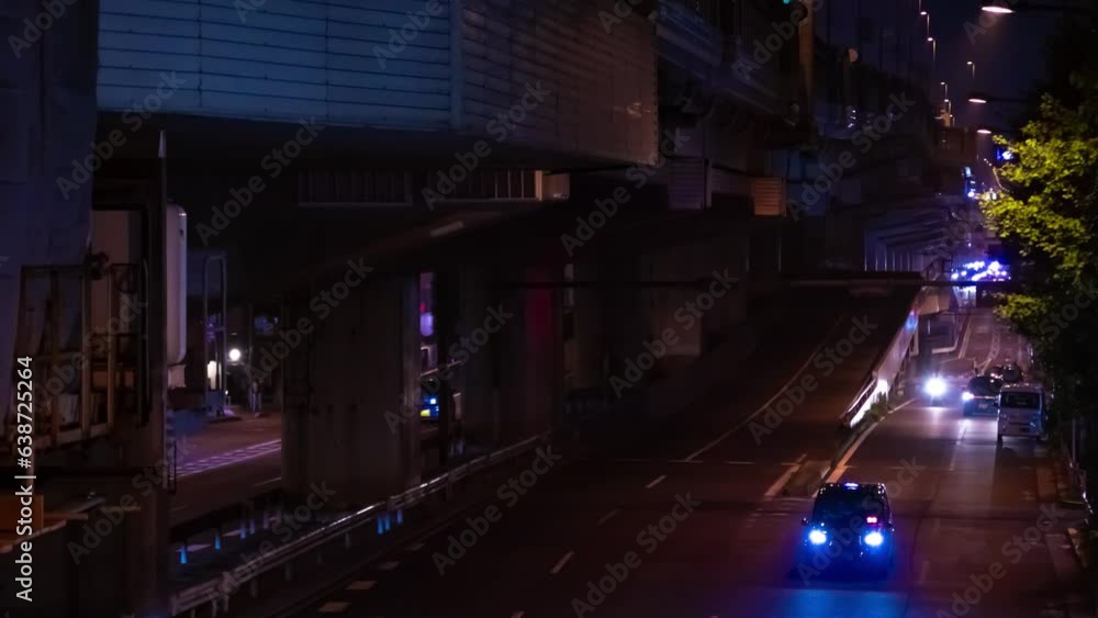 A night timelapse of the traffic jam at the city street under the highway in Tokyo A night timelapse of the traffic jam at the city street under the highway in Tokyo