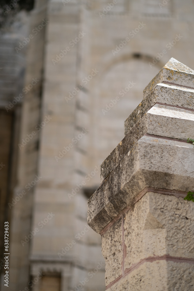 Detail of a stone column from the exterior wall of an old church in Jerusalem.