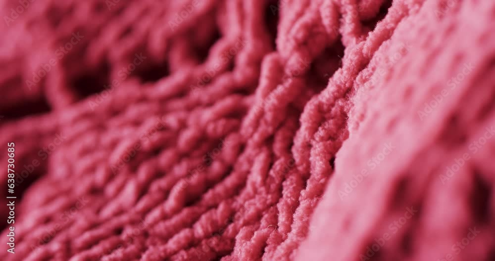 Micro video of close up of pink wooly crochet fabric with copy space Micro video of close up of pink wooly crochet fabric with copy space