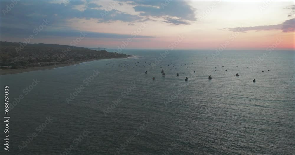 Aerial view of beautiful sunset behind in the ocean fishing boats. Aerial view of beautiful sunset behind in the ocean fishing boats.